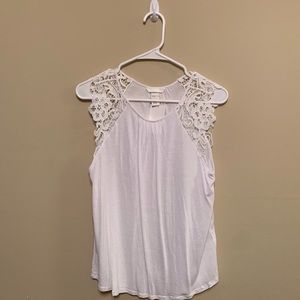 White sleeveless blouse